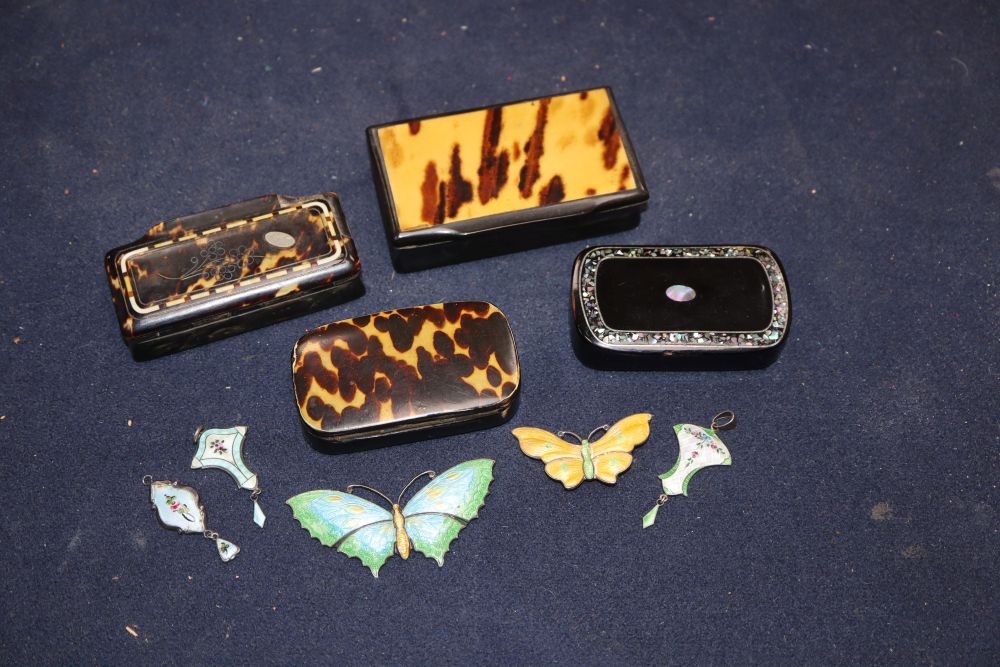 Four 19th century papier mache snuff boxes, two enamelled silver butterfly brooches and three pendants